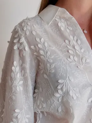 De tail chemise blanche