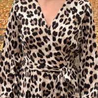 Robe le opard de tail